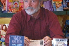 John at a book signing at City News in Cheyenne in 2003.